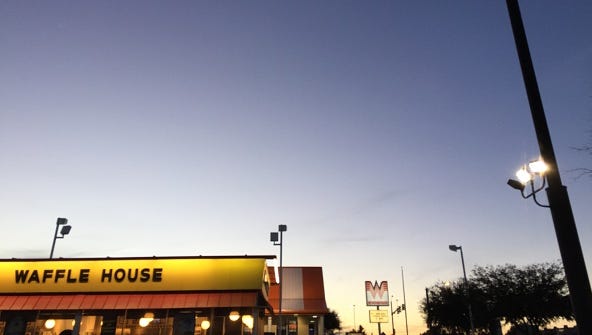 An Alabama man says in a lawsuit that grease and sewage from a nearby Waffle House seeped onto his property, doing thousands of dollars in damage.