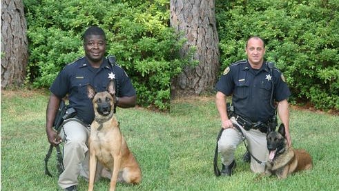 Cpl. Marcus Green and Hunter (left) and Cpl. Jamie Hendrix and Chuck (right)
