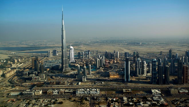 The Burj Khalifa, the world's tallest building, dominates the skyline of Dubai, in the United Arab Emirates.