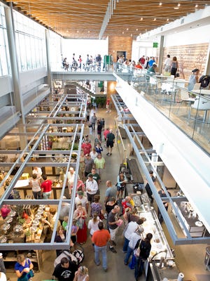 
Customers fill the aisle at the indoor vendor hall of Grand Rapids’ Downtown Market.
