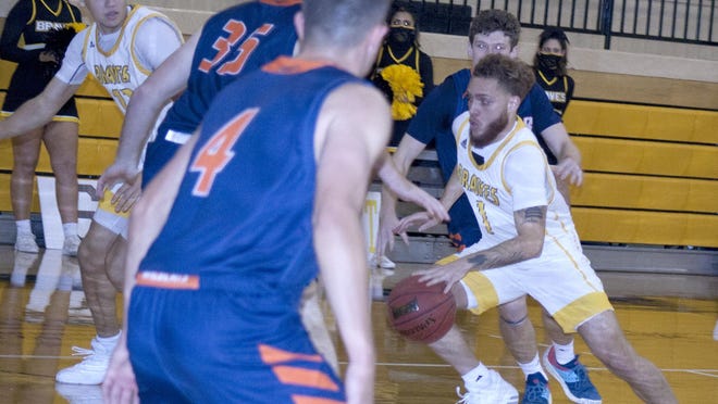 Ottawa University senior guard Perry Carroll, a former Ottawa High School standout, made an immediate impact for the Braves, averaging nearly 13 points a game.