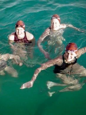 West High School swim team All-Americans, from left, Bethany Hall, Julia Stowers, Meghan Gutekunst, and Andrea Bennett in February of 1998.