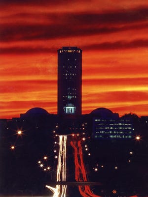The Florida Capitol, caught in a time-lapse photo of Apalachee Parkway traffic at night.
Mike Ewen/Democrat files
allahassee Democrat photographer Mike Ewen captured a colorful image of the Florida capitol in 1993, by shooting a time-lapse photo of Apalachee Parkway traffic at night.