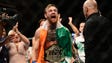 McGregor celebrates his second-round TKO of Chad Mendes