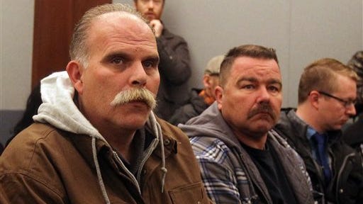 Robert Meyers, left, the widower of Tammy Meyers, attends a hearing for his wife's accused killer, Erich Nowsch Jr. in court Monday, Feb. 23, 2015, in Las Vegas. Nowsch remains jailed following his arrest Friday on murder, attempted murder and other charges in the Feb. 12 shooting that fatally wounded 44-year-old Tammy Meyers outside her home. (AP Photo/Isaac Brekken)