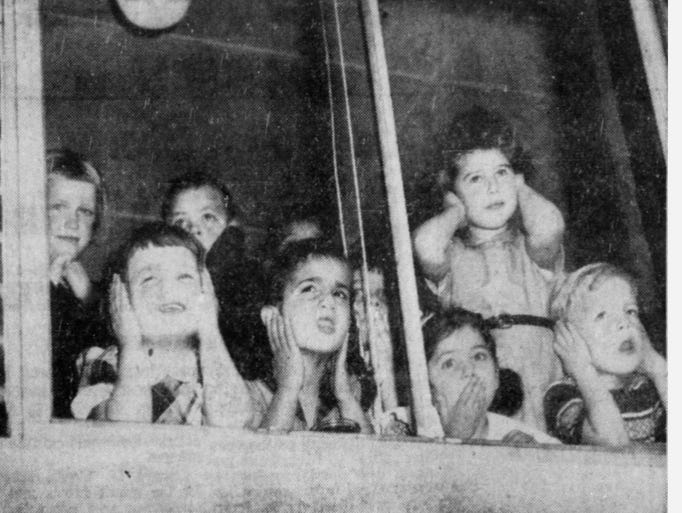 Rochester school children react in November 1955 to