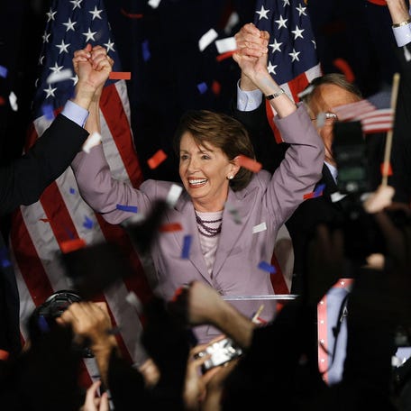 Pelosi celebrates with leading Democrats and supporters at the Hyatt Regency hotel on Capitol Hill on Nov. 7, 2006, after Democrats won the House in the midterm elections.