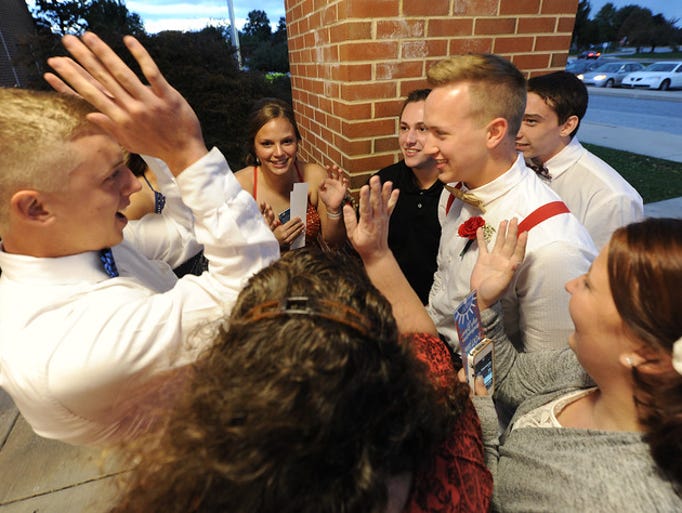 Students from Northeastern prepare to enter Homecoming