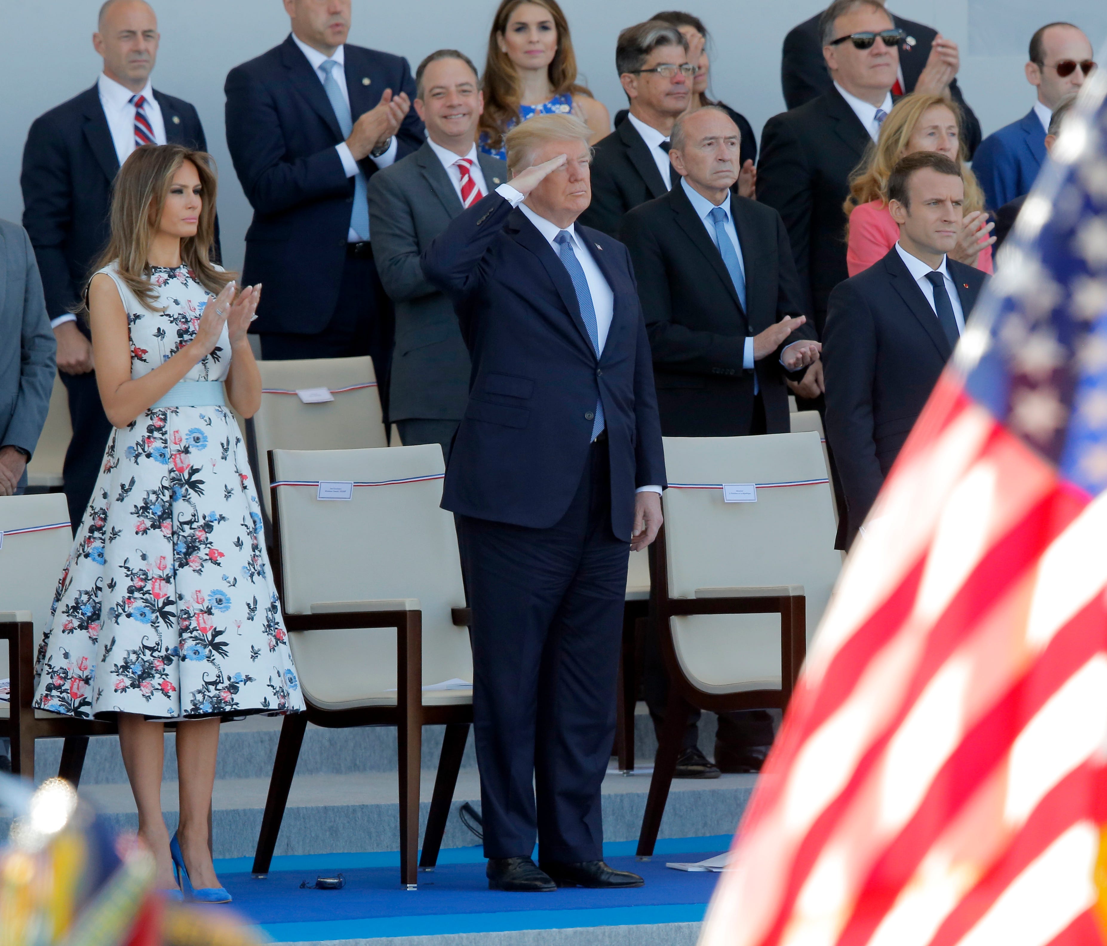 French President Emmanuel Macron, President Trump and first lady Melania Trump watch the traditional Bastille Day military parade on the Champs Elysees, in Paris, Friday, July 14, 2017.