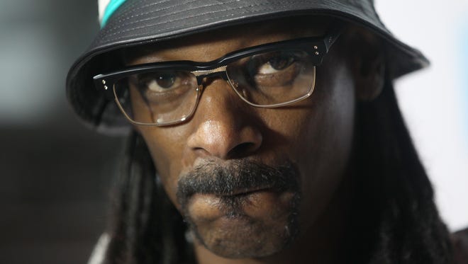 Snoop Dogg is seen at the 2015 DIRECTV Super Fan Fest on Friday, Jan. 30, 2015 in Glendale, Ariz.