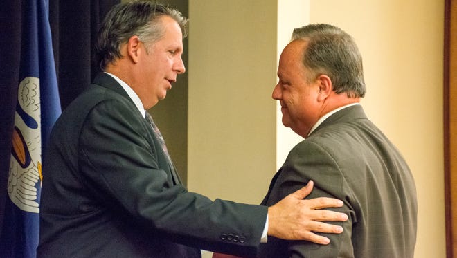City-parish CAO Dee Stanley and State Rep. Joel Robideaux participate in a city-parish president debate hosted by the Press Club Monday night.