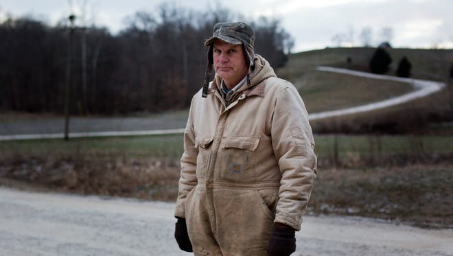 Stephen Sander, owner of Tiptop Turkey Farm in Dubois, Ind., continues to work Monday evening, Jan. 18, 2016, to prepare his farm for composting his dead turkeys that will begin Tuesday. Sander said he lost about 23,000 birds to the avian flu outbreak that was discovered in the Dubois area last week.