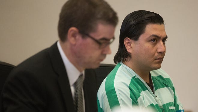 Defense attorney Daniel Northfield, left, and Jonathan Leyva Rodriguez listen at a court hearing for a motion to suppress evidence on Tuesday, March 22, 2016, at Polk County Courthouse in Des Moines.  Rodriguez was charged with homicide by driving while intoxicated, homicide by reckless driving and failure to render aid resulting in death of well-known bicycle enthusiast Gregary "Wade" Franck in August 2015.