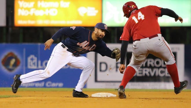 B-Mets Derrick Gibson puts the tag on Altoona's Edwin Espinal.