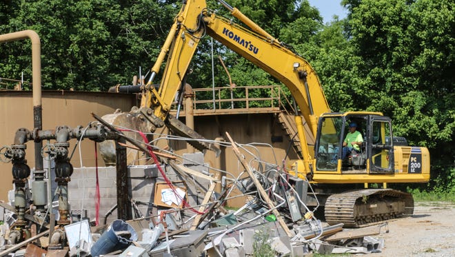 Demolition begins on the McNeely Lake Water Quality Treatment Center.  More than 300 of these neighborhood-scale treatment facilities have been removed by MSD.  This was the last one.June 23, 2016