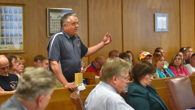 Jim Stannard, vice president of operations for the International Motor Contest Association, speaks Tuesday, July 19, 2016, to the Winnebago County Board of Supervisors in support of the Oshkosh Speedzone Raceway. Supporters filled the board room Tuesday evening to opine about the value of the dirt track.