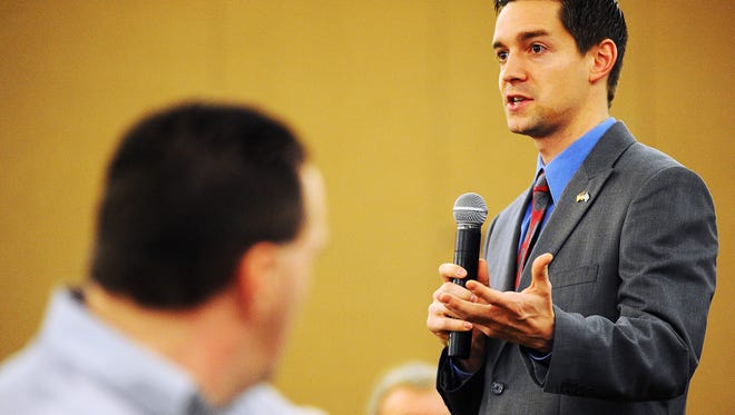 State Rep. Issac Latterell speaks during a Sioux Falls Chamber of Commerce forum in 2014.