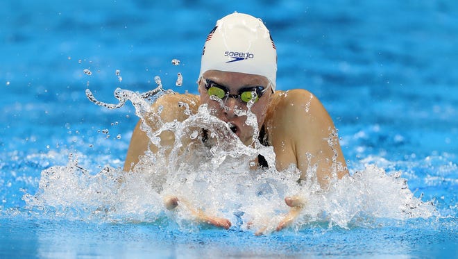 American Lilly King qualified first for Monday's 100-meter breaststroke final.