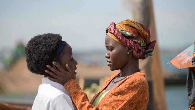 Lupita Nyong'o and Madina Nalwanga star in the triumphant true story "Queen of Katwe," directed by Mira Nair. The film opens Friday at Frank Theatres Queensgate Stadium 13.