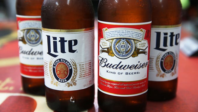 Joe Raedle, Getty Images
In this photo illustration, bottles of Budweiser and Miller Lite beer are seen on September 16, 2015 in Miami, Florida.