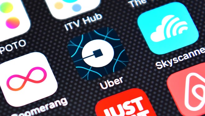 LONDON, ENGLAND - AUGUST 03:  The Uber app logo is displayed on an iPhone on August 3, 2016 in London, England.  (Photo by Carl Court/Getty Images)