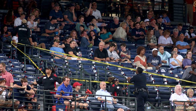 Turner Field security ropes off an area where fan Greg Murrey fell from the upper deck in the seventh inning of the game between the Braves and Yankees on Aug. 29, 2015.