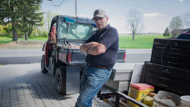 Luke Brubaker, 76, takes issue with calling workers on his family's Mount Joy dairy farm "immigrant workers;" he insists they are"essential workers." (Ed Hille/Philadelphia Inquirer/TNS) 