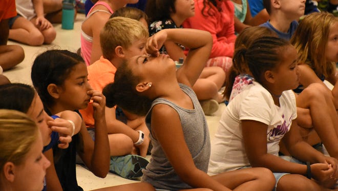 Kids learn that for CPR breaths to be effective, you tilt the head back and pinch the nose. The NCH Safe & Healthy Children's Coalition of Collier County held a water safety event July 27 for children attending Collier County's summer camp at Veterans Community Park.