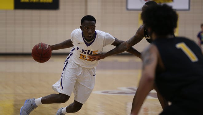 LSUS guard Josh Robinson drives to the basket against Texas Wesleyan Tuesday night at The Dock.