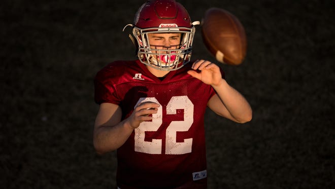 Cornersville's Eli Woodard keeps his eye on the ball during practice at Cornersville High School in Cornersville, Tenn., Tuesday, Nov. 21, 2017.