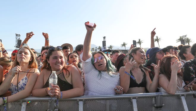 Apr 13, 2018; Indio, CA, USA;  Fans watch Kali Uchis performance during the Coachella Valley Music and Arts Festival at Empire Polo Club. Mandatory Credit: Jay Calderon/The Desert Sun via USA TODAY NETWORK