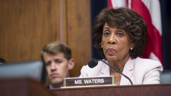 Ranking Member Maxine Waters, D-Calif., looks on...