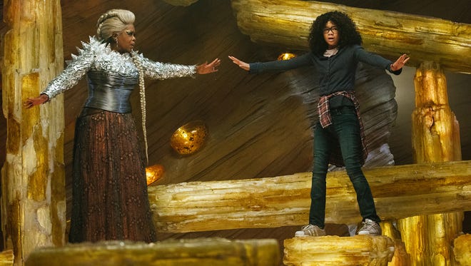 Oprah Winfrey as Mrs. Which and Storm Reid as Meg Murry in Disney's "A Wrinkle in Time."