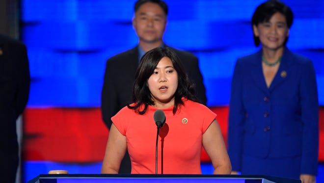 Rep.  Grace Meng, DN.Y., speaks while standing with fellow Asian-American and Pacific Island members of Congress, during the 2016 Democratic National Convention at Wells Fargo Center.  on July 27, 2016 in Philadelphia.