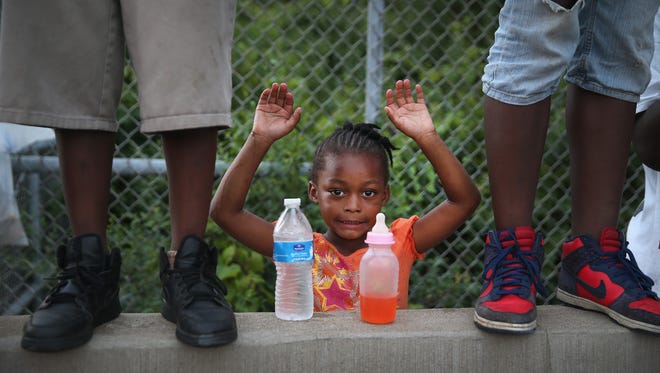 Gabrielle Walker, 5,  protests the killing of teenager Michael Brown on August 17 in Ferguson, MO.