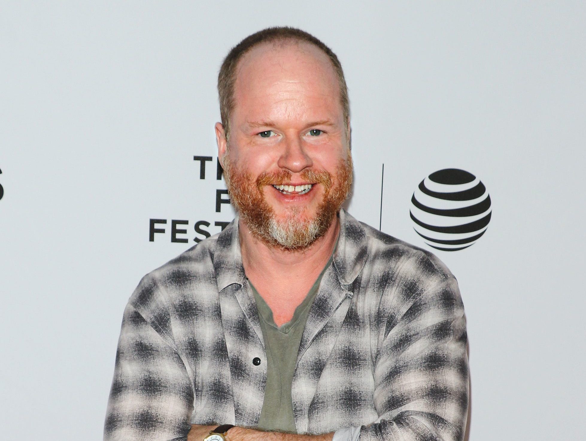 Joss Whedon has been called a hypocrite 'preaching feminist ideals' by his ex-wife in a scathing essay.
