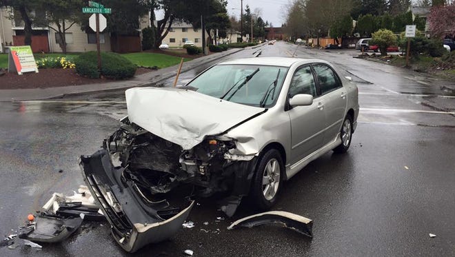 A two-vehicle crash on Lancaster Drive NE injured one and restricted lanes Wednesday afternoon.