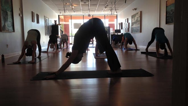 Have you been wanting to try yoga or maybe experiment with a new class? This is the time to do it! Join the #MindfulMay movement this week. Photo: Downtown Yoga Suntree