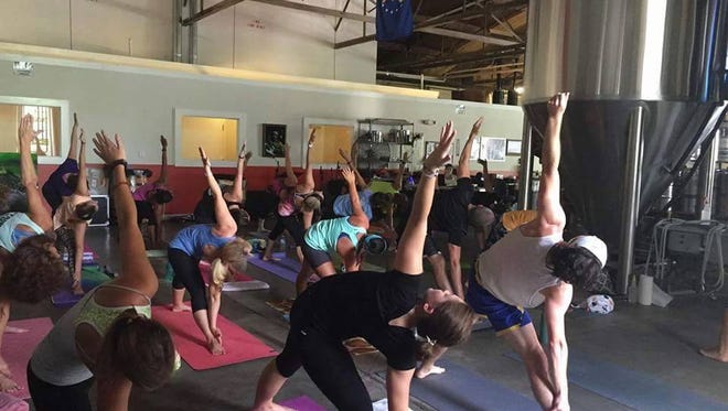 Lacy Welker hosts Yoga and Beer at 1 p.m. every other Saturday at Mayday Brewery.