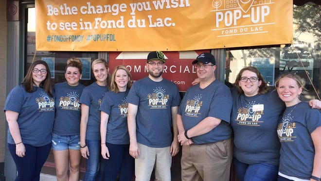 From left, Katie Tank, Jenna Floberg, Jenny Knuth, Shawn Fisher, Joe Truesdale, Steve Leaman, Sarah Spang and Gina Popp are the founders of Pop-Up Fond du Lac.