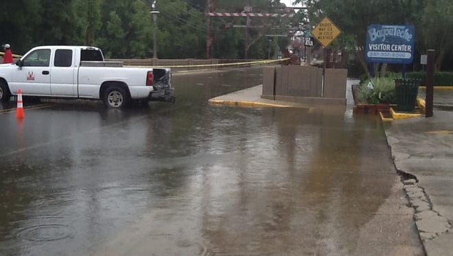 The Bayou Teche floods downtown Breaux Bridge on Saturday, Aug. 13.