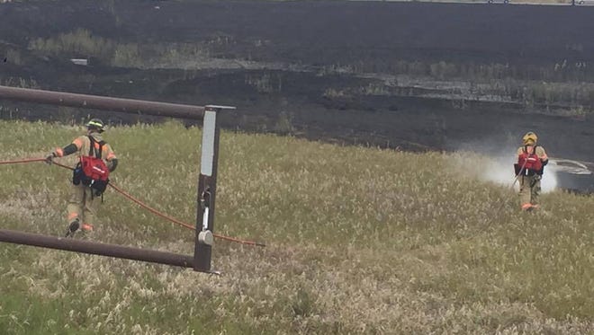 Crews responded to a reported grass fire Sunday near the intersection of Timberline and Carpenter roads.