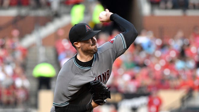 Jul 28, 2017: Arizona Diamondbacks starting pitcher Robbie Ray (38) pitches during the first inning against the St. Louis Cardinals at Busch Stadium.