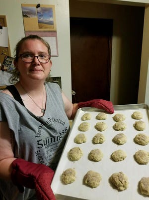 Mandy Coriston shows off a batch of her freshly-baked snickerdoodle cookies at her home in Newton, N.J.