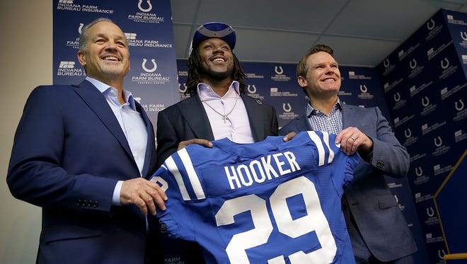 The Indianapolis Colts introduced their first round draft pick, Malik Hooker, safety from Ohio State, during a press conference Friday, April 28, 2016, afternoon at the Colts complex on West 56th Street. Here Hooker poses for a photo with Colts head coach Chuck Pagano,left, and general manager Chris Ballard.