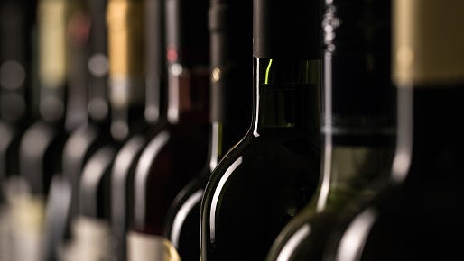 Row of vintage wine bottles
