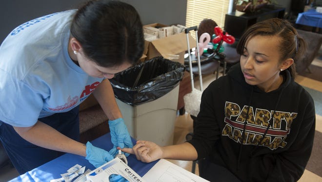A Camden teen is tested for diabetes at CAMcare in this file photo.