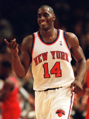 FILE - In this Dec. 3, 1995 file photo, New York Knicks Anthony Mason runs down court during an NBA basketball game against the Washington Bullets in New York.  The New York Knicks spokesman Jonathan Supranowitz confirmed Saturday, Feb. 28, 2015 that Mason, a rugged power forward who was a defensive force for several NBA teams in the 1990s, has died. He was 48.  (AP Photo/Ron Frehm)