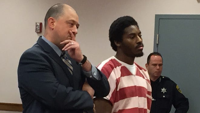 Trevis Johnson is joined by his defense lawyer, Benjamin Bergman, at his sentencing in Broome County Court. Johnson received 19 years in state prison for first-degree manslaughter in the October 2013 shooting death of Sergio Beldo at a Mather Street residence in Binghamton.