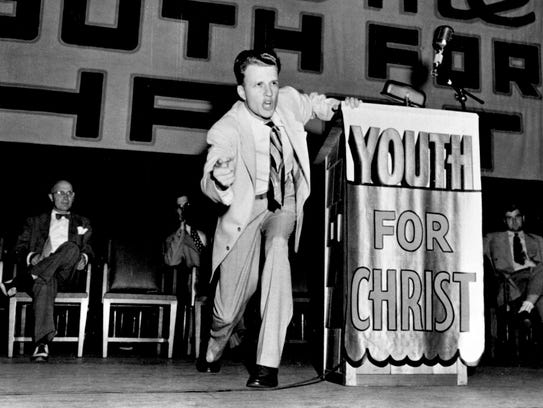 Billy Graham delivers a sermon at age 27.